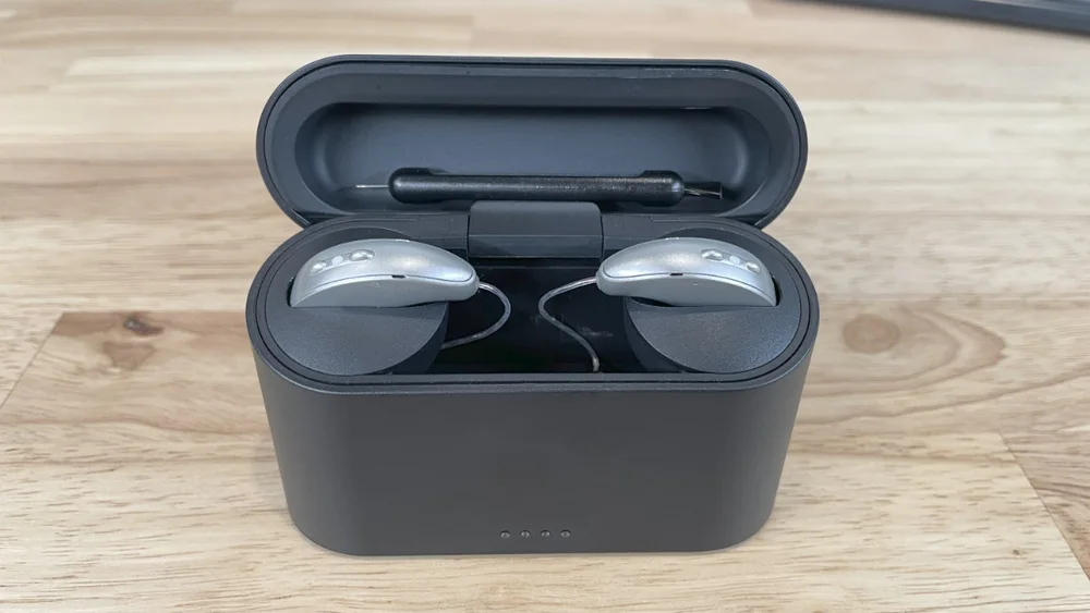 Starkey Edge AI - Starkey Edge AI RIC RT pair in charging case, photographed in the HearAdvisor lab by the original reviewer. Other family styles differ.