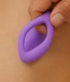 We-Vibe Sync O - Physical We-Vibe Sync O held in a hand; cropped to a product detail from the maker photograph. Original source crop is100 x116pixels.